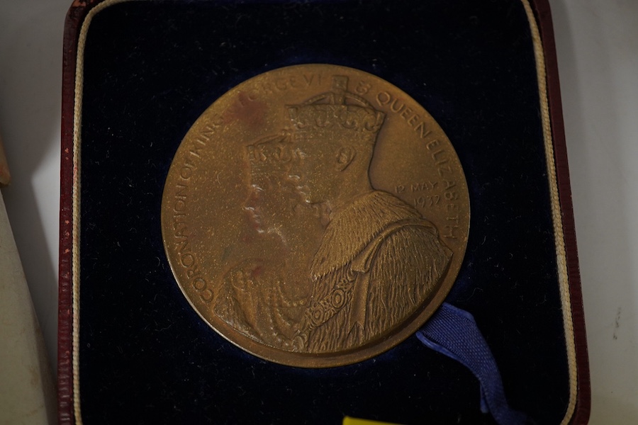 A small collection of coins including; George III pennies, cartwheel pennies, etc. Victoria 3d pieces, George V, etc. 3d pieces, an ERII coronation medal, a George VI Coronation medallion produced for the Mayfair hotel,